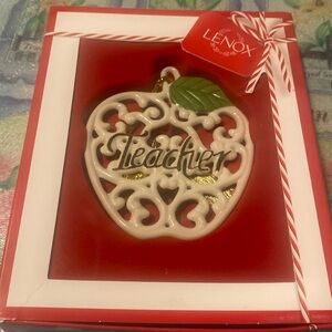 Lenox Teacher ornament.  Crème filigree apple with the word teacher in gold